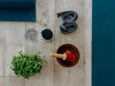 Yoga blocks and strap on floor